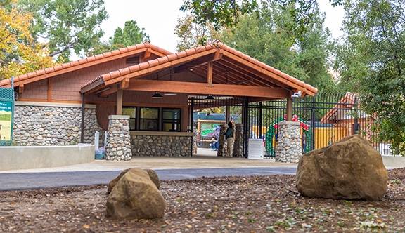 New zoo entry plaza, Craftsman style with stone footing and wooden upper