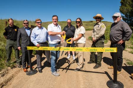 Donald P. Wagner, Chairman of the Orange County Board of Supervisors and OC Parks Interim Director Pam Passow cut the ribbon to commemorate the opening of  Saddleback Wilderness. 