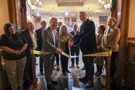 Ribbon cutting for Omnivision: Art Across Boundaries exhibit now on display at the Old Orange County Courthouse. 